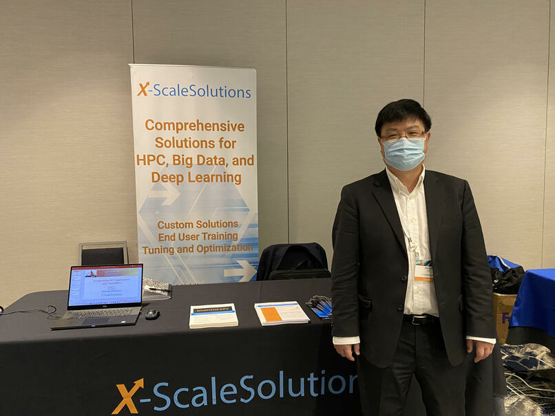 Dr Donglai Dai at the X-ScaleSolutions' booth